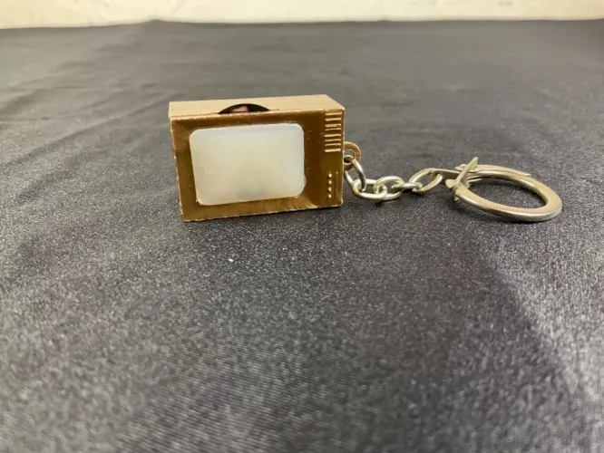 1 PORTE-CLES VISIONNEUSE PIN-UP CURIOSA EROTIQUE