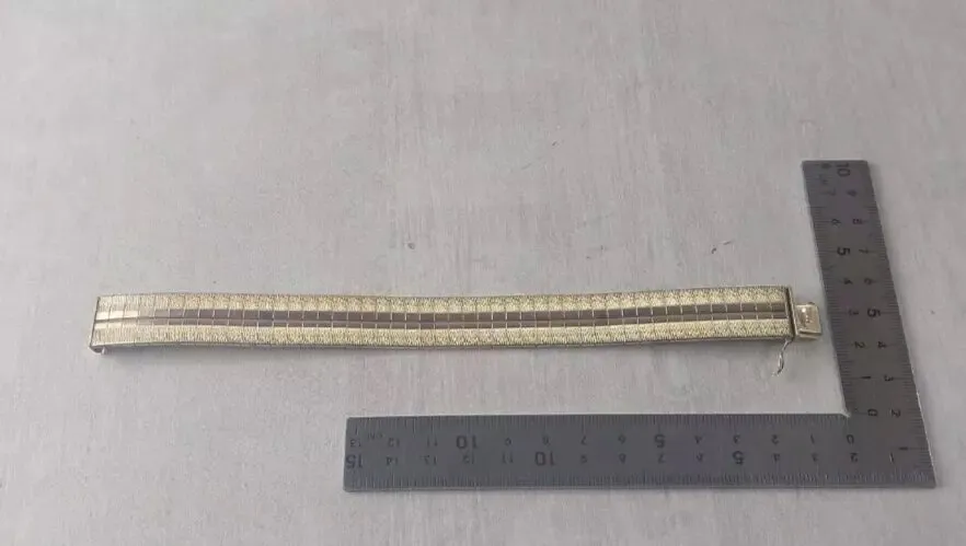 Ancien bracelet, jonc / manchette articulé, en plaqué or