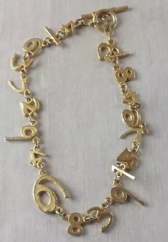 Ancien collier en métal doré, chiffres, Biche de Bère, vintage