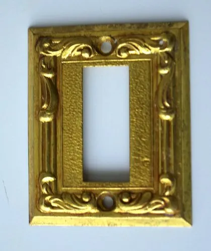 ancien enjoliveur plastron pour interrupteur mistral en laiton dore n°1