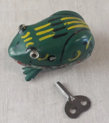 Ancien jouet mécanique, grenouille à clé, en tôle