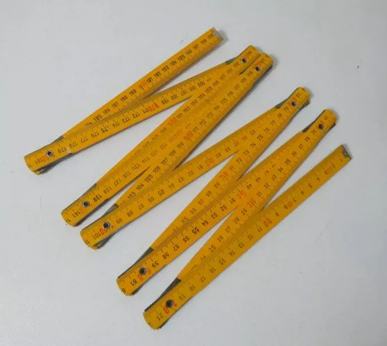 ancien mètre pliant en bois jaune 200cm