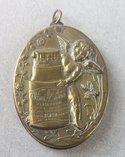 Ancien petit miroir de poche / chatelaine, publicitaire / religieux, Crème Simon