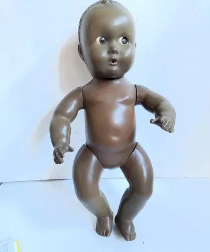 Ancien poupon dorgine italienne marque bonomi en bon etat(made in chiner)