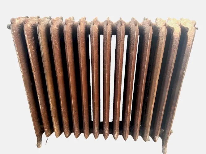 Ancien radiateur sur pied a quatorze lames fleuries en fonte de fer XX siècle
