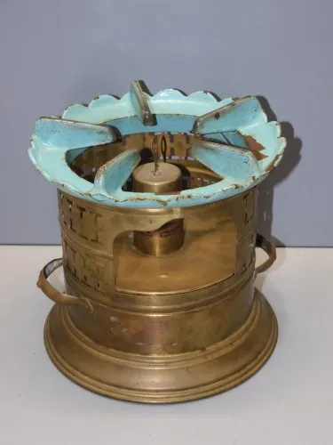 - ANCIEN RECHAUD A PETROLE LAITON et FONTE EMAILLEE ART DECO FORME RONDE  D