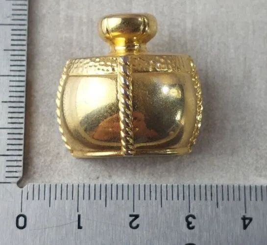 Ancienne broche champagne, en métal doré, Yves Saint Laurent, vintage