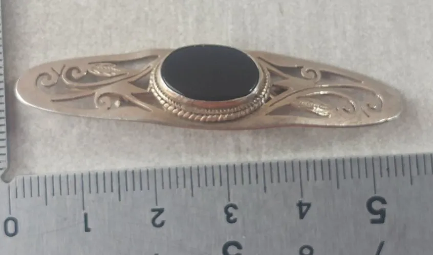 Ancienne broche, en argent massif et onyx, art déco