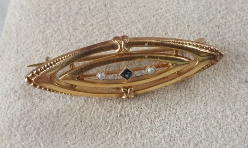 Ancienne broche en métal doré, art déco