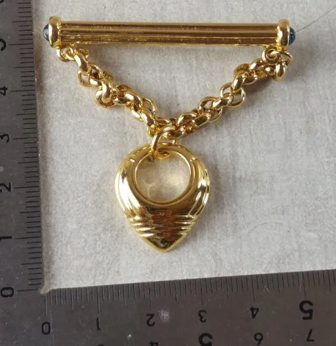 Ancienne broche en métal doré, Boucheron Paris