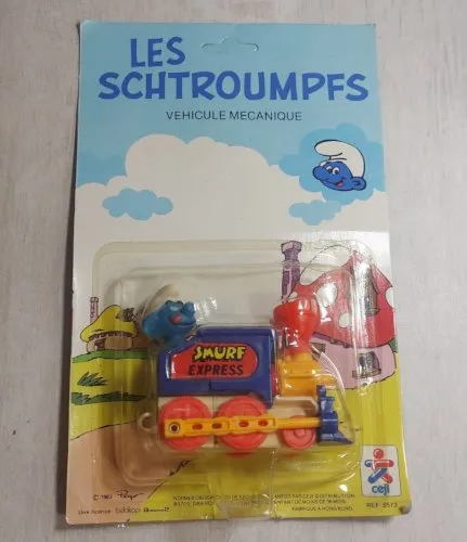 Ancienne locomotive / véhicule, Schtroumpfs, Ceji / Peyo, sous blister, 1983