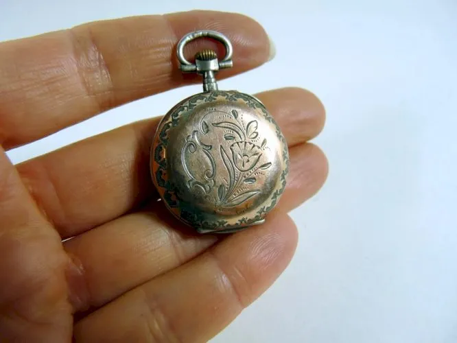 Ancienne montre gousset argent massif doré gravé Art Nouveau tulipes poinçons