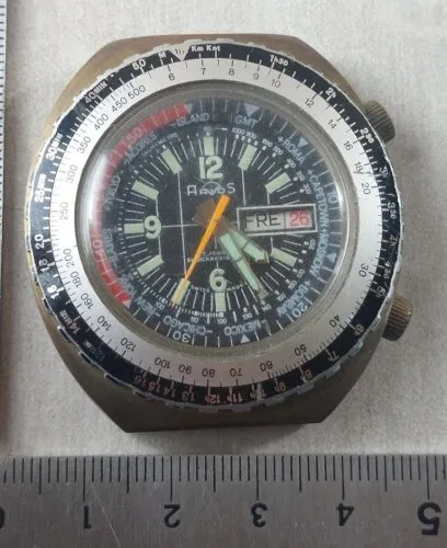 Ancienne montre mécanique, Arios à double couronne, World Time, vintage