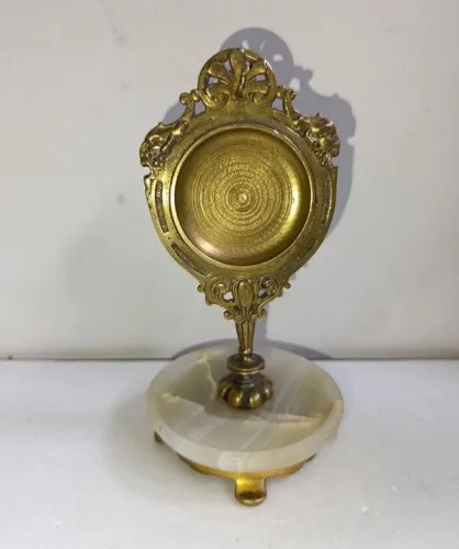 Beau porte montre ancien en bronze/ laiton ? Pivotant avec crochet dattache en bon etat (made in chiner )