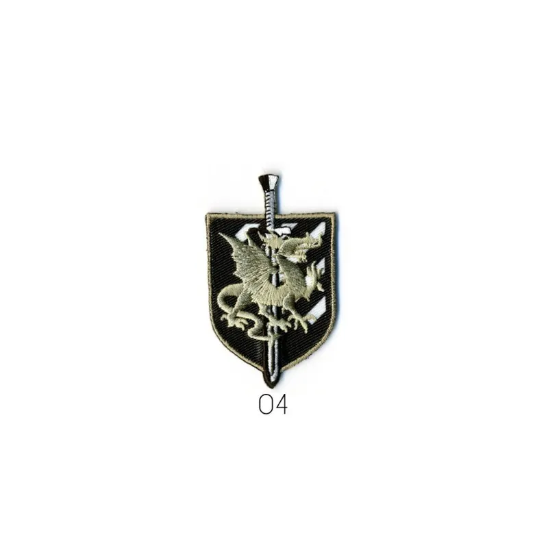 Blason dragon 6x3,5cm - Fond noir/beige