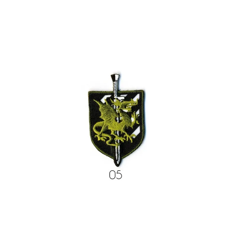 Blason dragon 6x3,5cm - Fond noir/olive