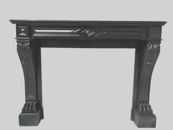 Cheminée Napoléon III a pieds griffes en marbre noir XIX siècle