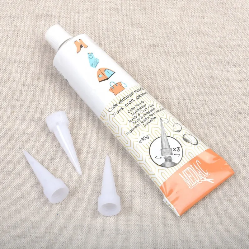 Colle tissu transparente