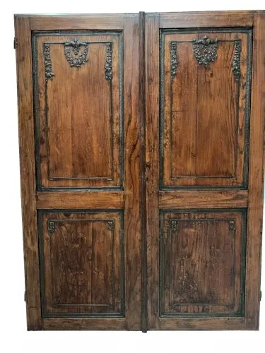 Double portes de placards en chêne sculpté XX siècle