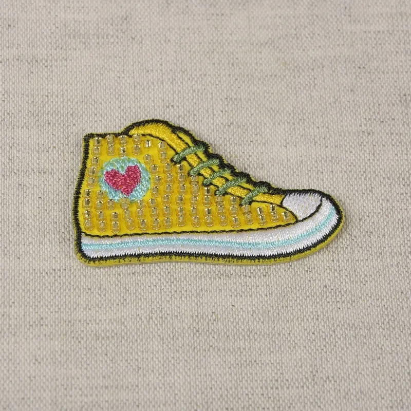 Ecusson en perle - Chaussure