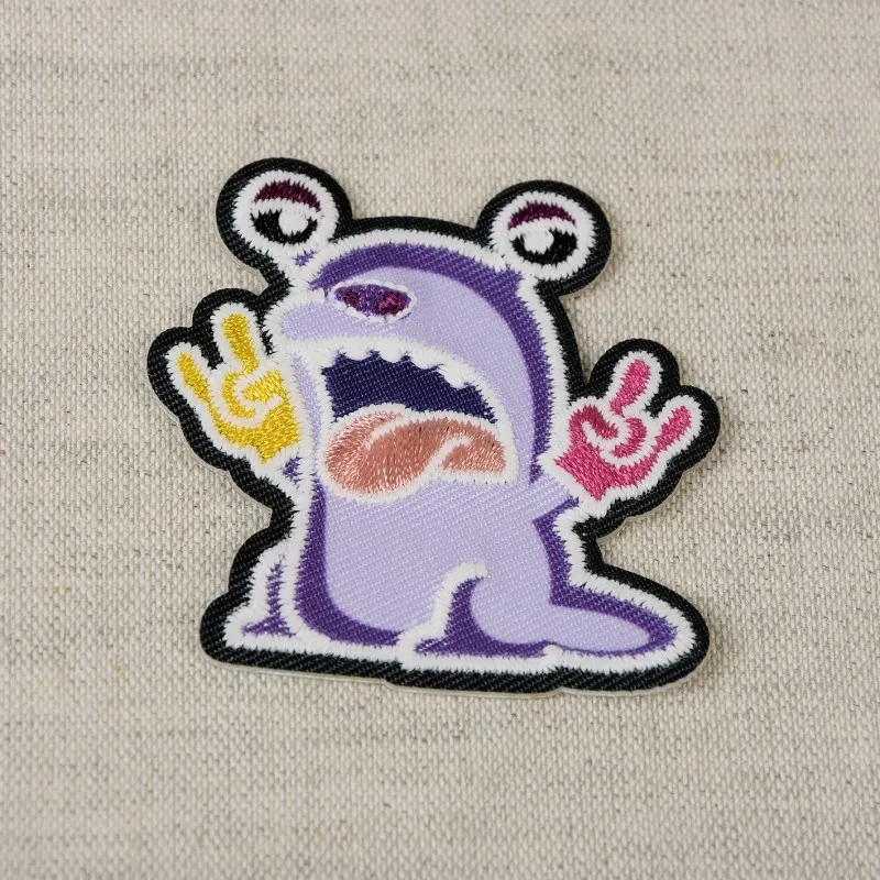 Ecusson monstre lumines - Monstre violet