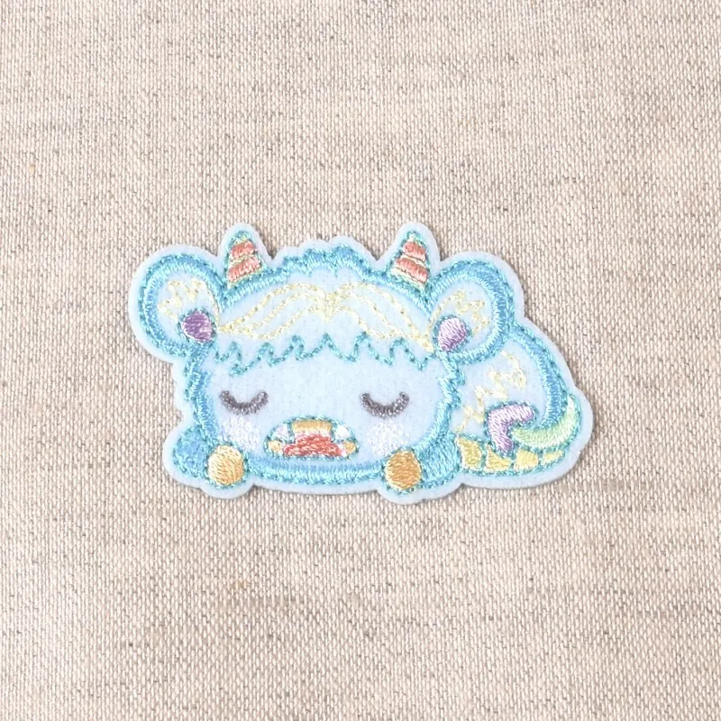 Ecusson monstres rigolos - Chèvre bleue