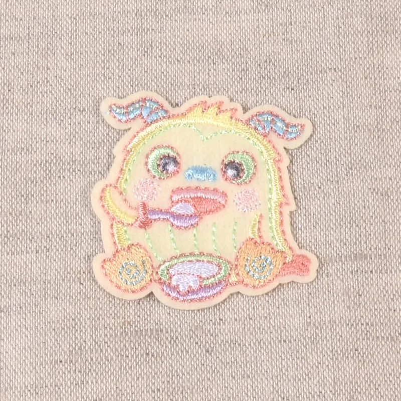 Ecusson monstres rigolos - Monstre qui man