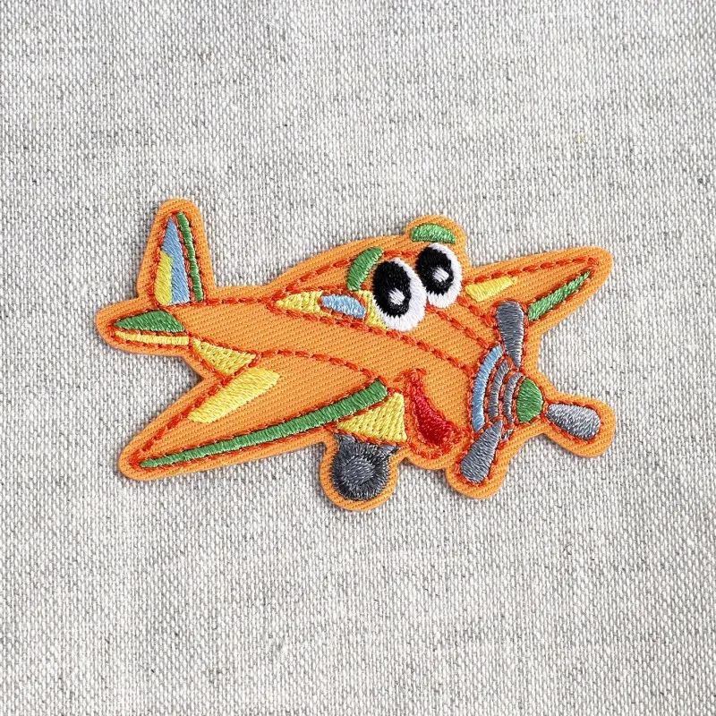 Ecusson transports rigolos - Avion orange