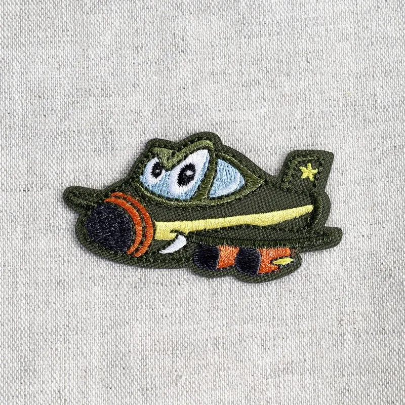 Ecusson transports rigolos - Avion vert