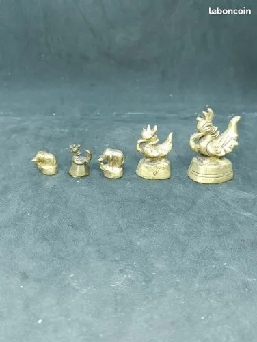 Lot de 5 anciens poids a opium dorigine birman en bronze à decor animalier en bon etat (made in chiner)