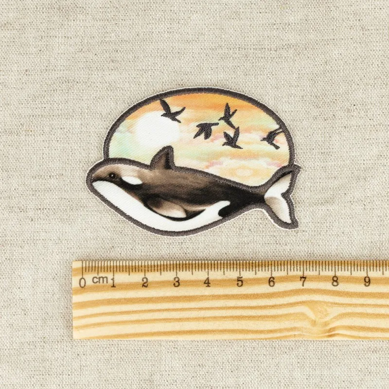 M ecusson baleine - Oiseaux