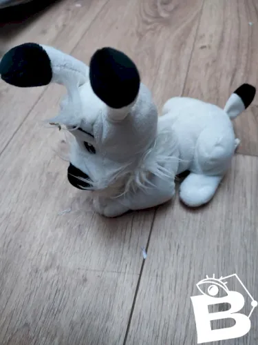 peluche asterix idefix couché en bon etat