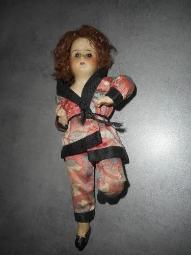 POUPEE ANCIENNE EN TERRE CUITE