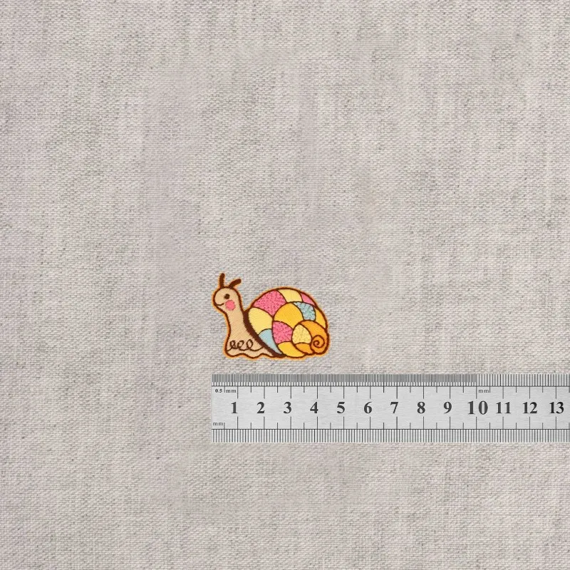 S ecusson dans le jardin - Escargot