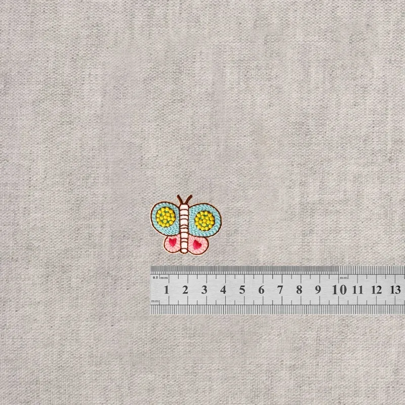 S ecusson dans le jardin - Papillon