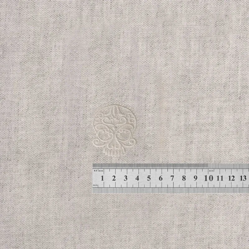 S ecusson en dentelle - Tête de mort blanc