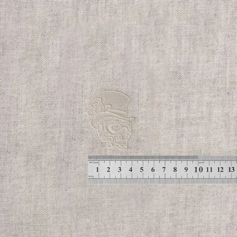 S ecusson en dentelle - Tête de mort blanche