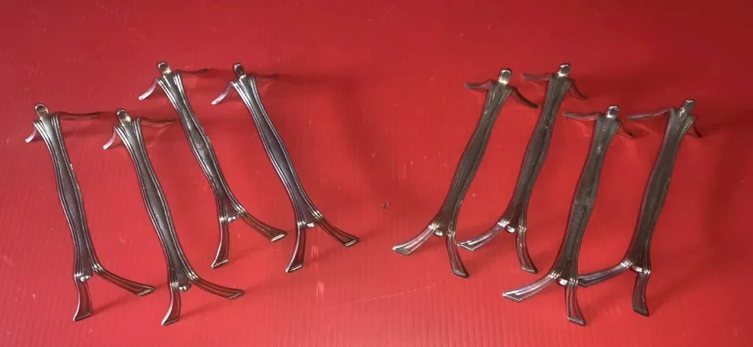 Suite de 8 porte couteaux en métal argenté maison CHRISTOFLE modèle boréal