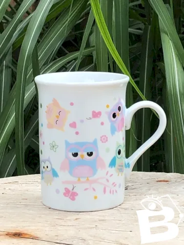 Tasse en porcelaine motifs hiboux couleurs pastels