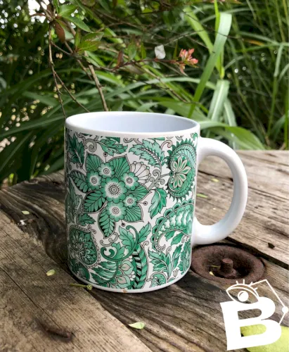 Tasse vintage verte et blanche