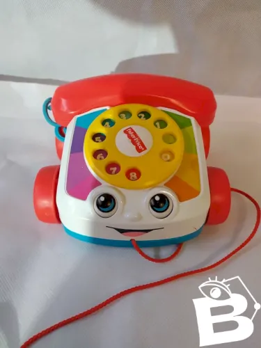 Téléphone a tirer Fisher Price en bon état