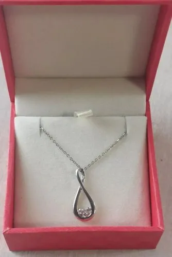 Très beau collier + pendentif, en argent massif et zircon, infini, Didier Guérin