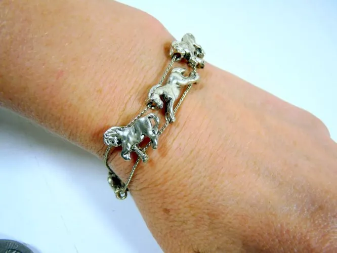 Vintage bracelet argent ? motifs chevaux style Jean Skinner L - 20 cm